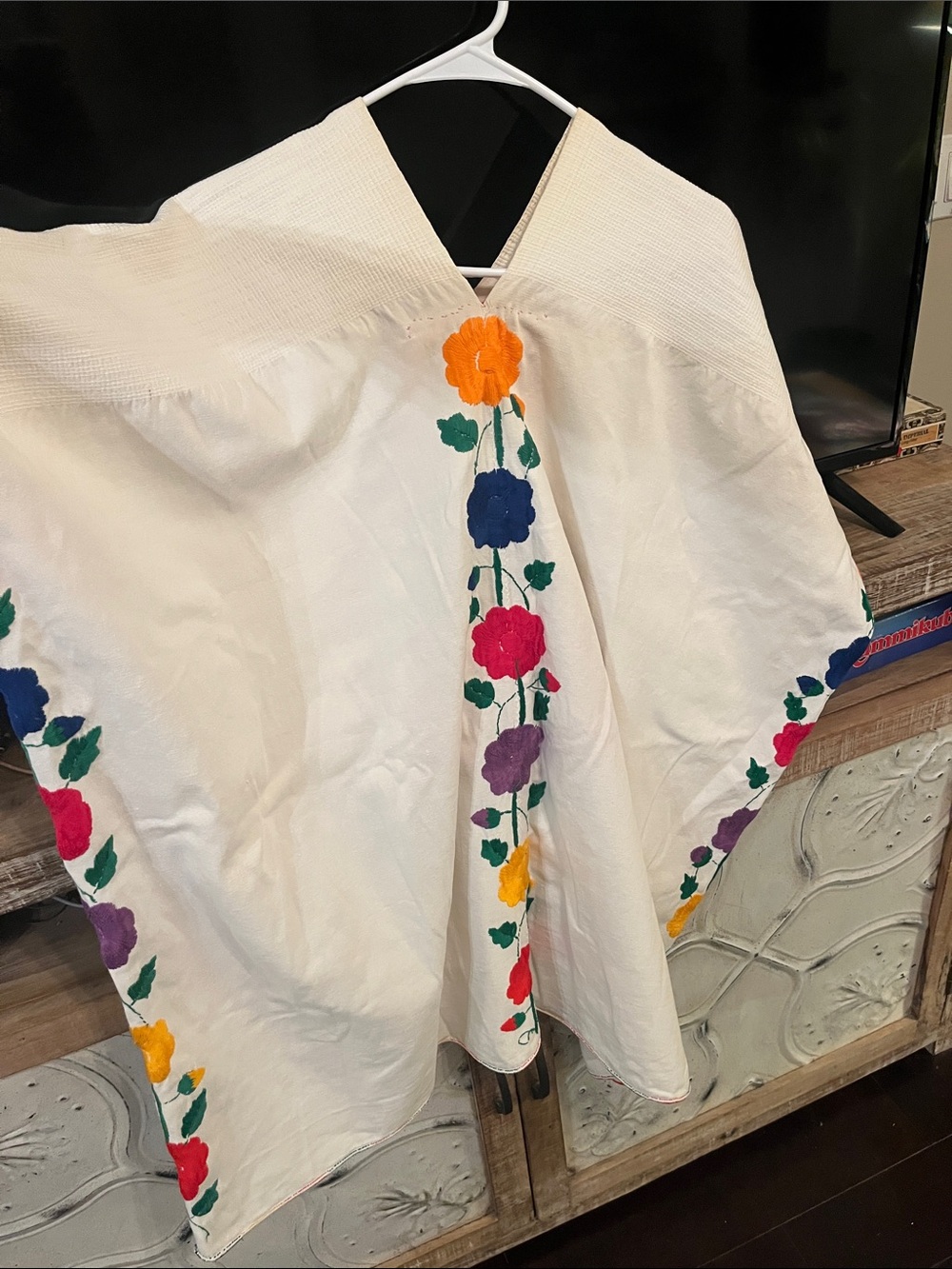 Embroidered White Women's V-Neck Top with Multicolor Floral Trim